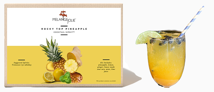 Mélange Jolie Rocky Top Pineapple Cocktail SipKit™ with glass, bar spoon, and ingredients for making refreshing cocktails.